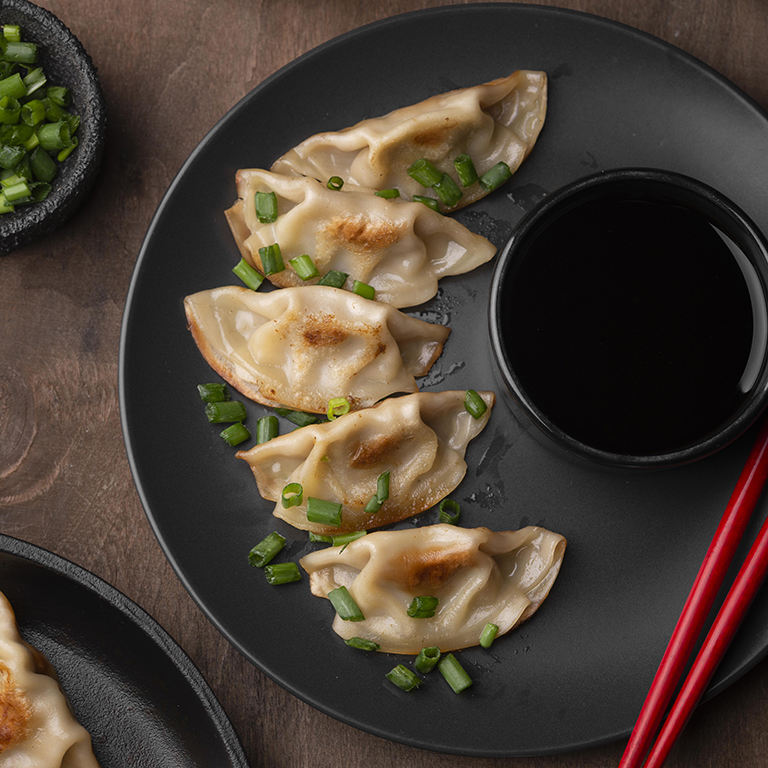 top-view-asian-dish-plate-with-herbs